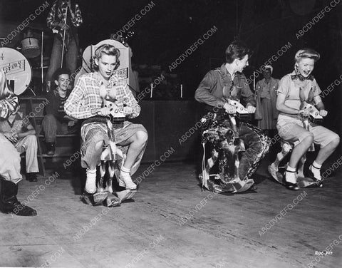candid Judy Garland Donald O'Connor having a rocking horse contest 6556-33