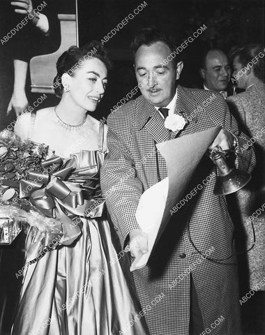 candid Joan Crawford getting award and gifts 6573-35