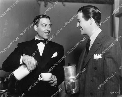 Joseph Calleia has the cream Robert Taylor has the coffee 6631-16