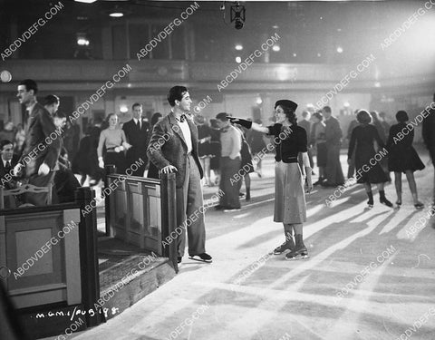 Robert Taylor Maureen O'Sullavan go ice skating film A Yank at Oxford 6632-12