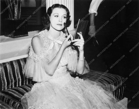 candid Eleanor Powell fixing her makeup behind the scenes MGM 6977-21