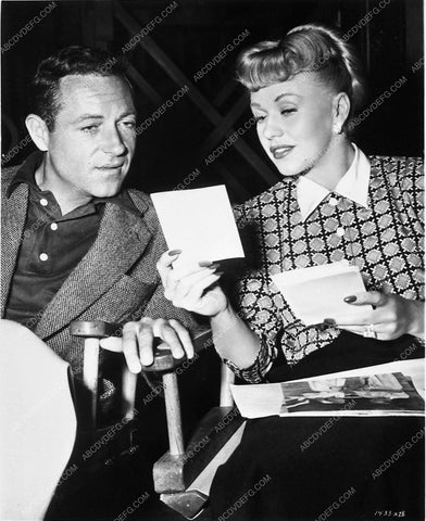 candid Charles Walters Ginger Rogers looking at photos 7316-14