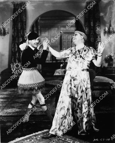 Charley Chase in lamp shade skirt and garters w Del Henderson short film In Walked Charley 7319-14