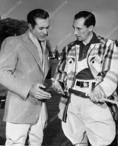 candid Ricardo Montalban Michael Rennie look over polo mallet 7368-08