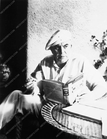 candid director James Cruze reading Washington Merry-Go-Round 7667-07