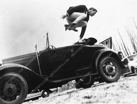 John Scott jumping from the car film The Horror of Party Beach 7975-25