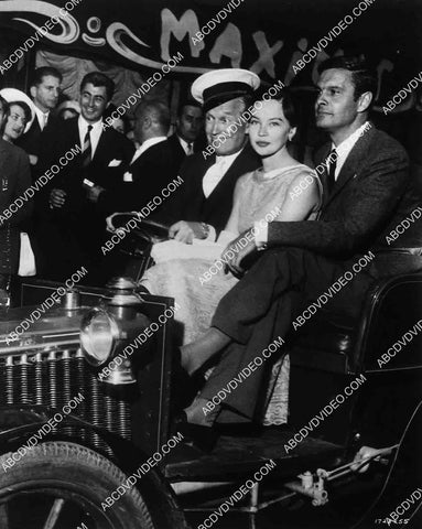 candid Maurice Chevalier Leslie Caron Louis Jourdan promote film Gigi 8207-26