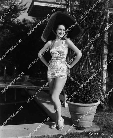 shapely Dorothy Lamour modeling her new swimsuit 8242-10