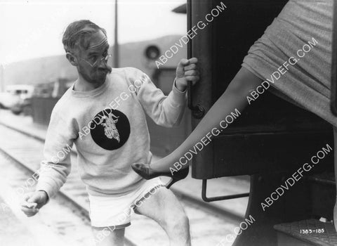Andy Clyde gets a glimpse of leg short subject film 8B11-275
