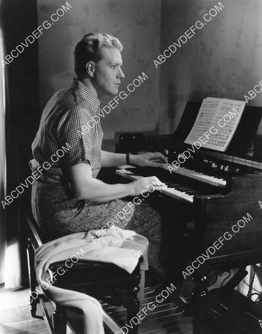Nelson Eddy rehearsing at the piano 8B11-738