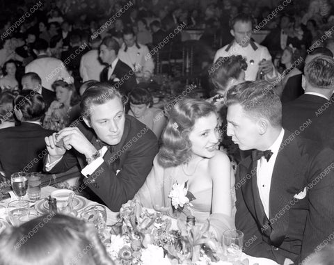 William Holden Brenda Marshall Eddie Bracken dine at Oscars 8b03-200