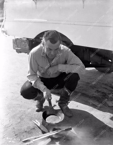 Buck Jones cooks up pancakes on the set 8b03-356