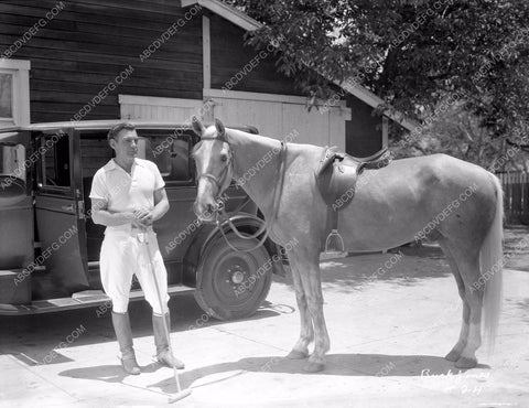 Buck Jones and equestrian garb goes horseback riding 8b03-364
