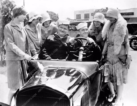 Stan Laurel Oliver Hardy surrounded by babes in new car 8b03-447