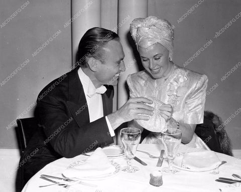 wardrobe costume designer Walter Plunkett dining with? 8b4-498