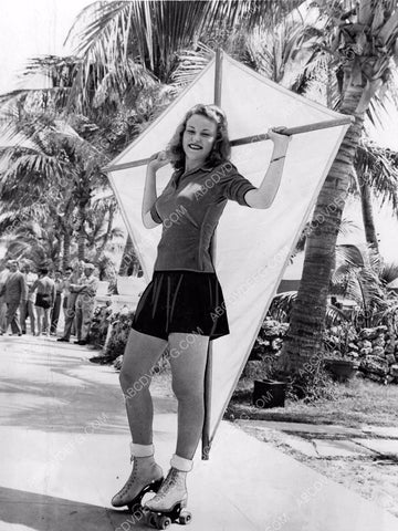 unknown hottie uses giant kite for power on Miami Beach boardwalk 8b6-093