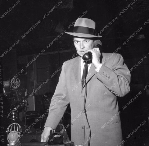 Ronald Reagan on telephone behind scenes TV G. E. Theater 8b6-293