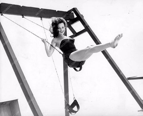 Charlotte Austin barefoot in swimwear enjoying the swing set 8b6-450