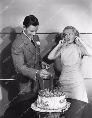 George Murphy loads Jean Arthur's Birthday Cake w firecrackers 8b6-479