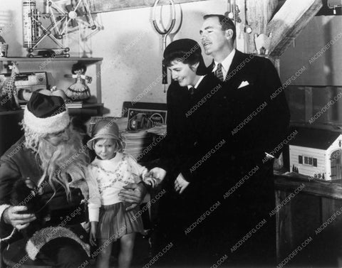candid Pat O'Brien and family visiting Santa Clasu 9077-17