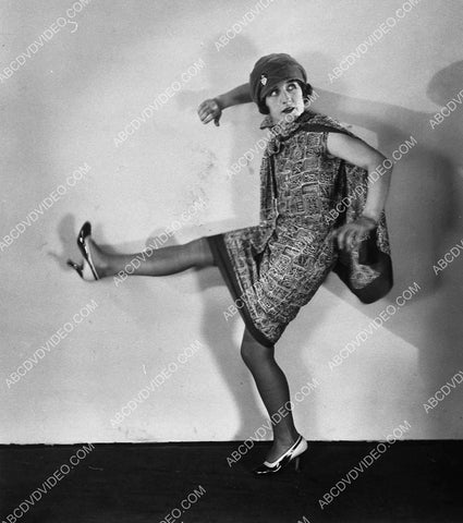 Norma Shearer kicking up her heels 9694-6
