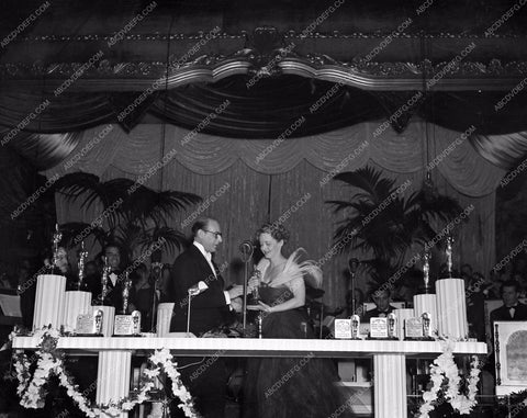1938 Oscars Bette Davis getting her Academy Award Statue aa1938-10</br>Los Angeles Newspaper press pit reprints from original 4x5 negatives for Academy Awards.