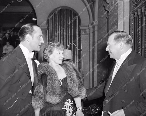 1938 Oscars Basil Rathbone and wife ? At Academy Awards aa1938-20</br>Los Angeles Newspaper press pit reprints from original 4x5 negatives for Academy Awards.