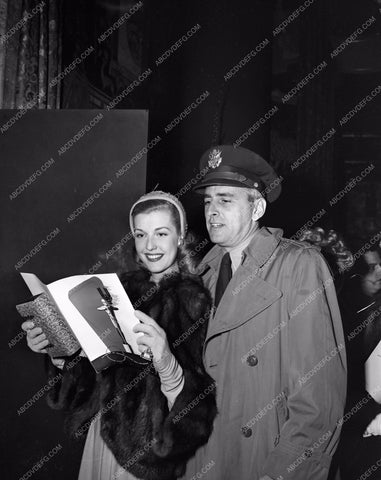 1943 Oscars Anita Louise reading her program Academy Awards aa1943-16</br>Los Angeles Newspaper press pit reprints from original 4x5 negatives for Academy Awards.