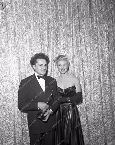 1951 Oscars Lana Turner on stage Academy Awards aa1945-19</br>Los Angeles Newspaper press pit reprints from original 4x5 negatives for Academy Awards.