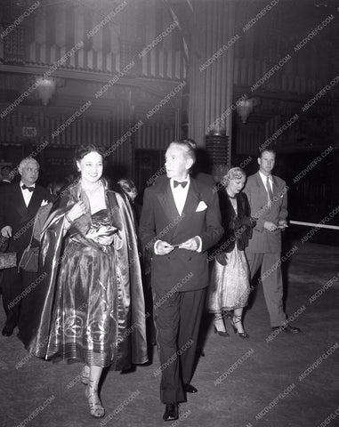 1949 Oscars Clifton Webb and datearriving at Academy Awards aa1949-09</br>Los Angeles Newspaper press pit reprints from original 4x5 negatives for Academy Awards.