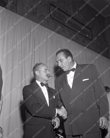 1954 Oscars Darryl F. Zanuck Mike Mazurki candid Academy Awards aa1954-12</br>Los Angeles Newspaper press pit reprints from original 4x5 negatives for Academy Awards.