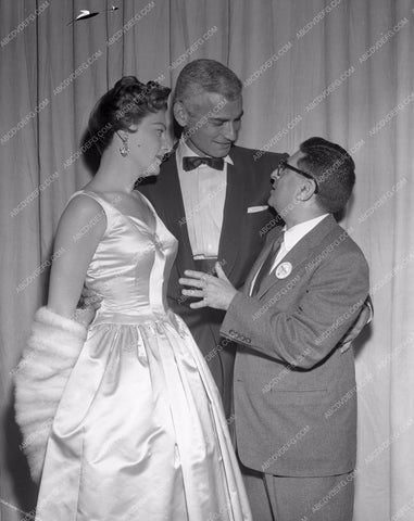 1955 Oscars Jeff Chandler and date Academy Awards aa1955-41</br>Los Angeles Newspaper press pit reprints from original 4x5 negatives for Academy Awards.