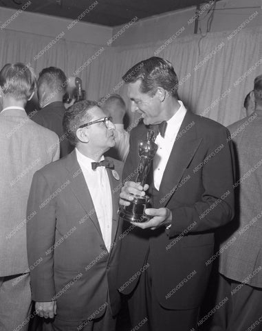 1957 Oscars Cary Grant and reporter Academy Awards aa1956-52</br>Los Angeles Newspaper press pit reprints from original 4x5 negatives for Academy Awards.