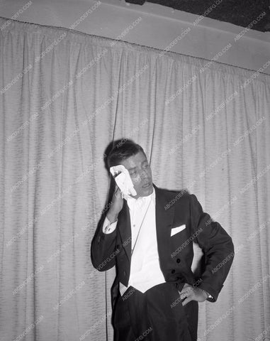 1957 Oscars Jerry Lewis catches his breath Academy Awards aa1956-68</br>Los Angeles Newspaper press pit reprints from original 4x5 negatives for Academy Awards.