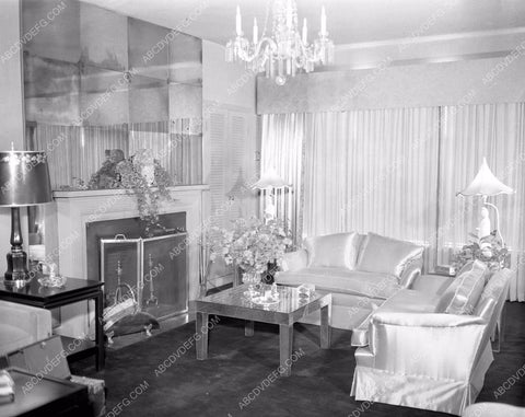 Carole Landis gives tour of home for newspaper carlan45-01