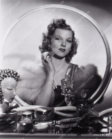 Joyce Matthews applies makeup finishing touches 8b20-0338