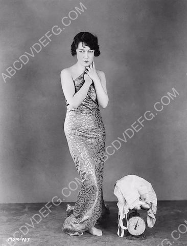 weighing her clothes Dorothy Sebastian 8b20-0918