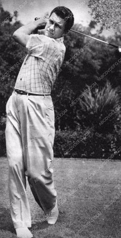 Dennis Morgan swinging the golf club 8b20-10321