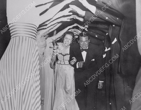 Cary Grant and wife maybe at a party 8b20-10583