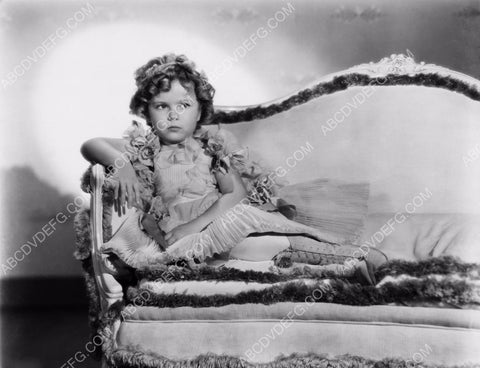Shirley Temple relaxing on the couch portrait 8b20-1100