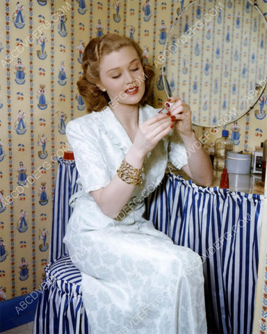 Joan Caulfield painting her fingernails 8b20-11125