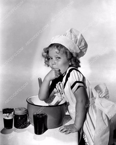 Shirley Temple testing the batter before it goes in the oven 8b20-1123