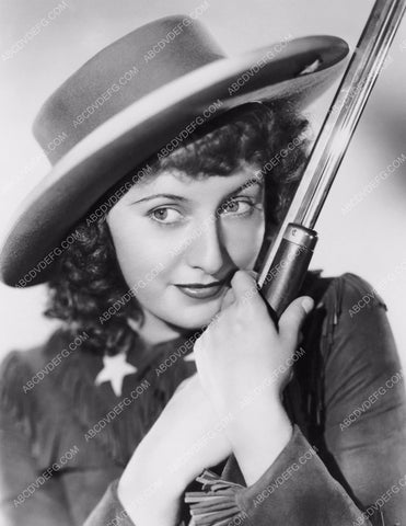 Barbara Stanwyck and rifle film Annie Oakley 8b20-11760