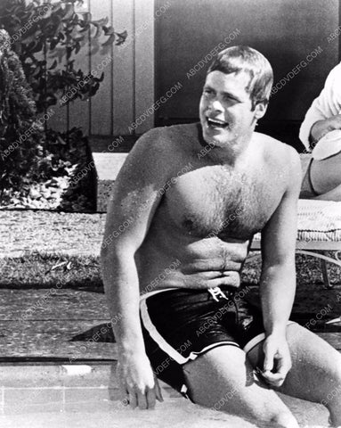 athletic Doug McClure takes a break between swimming some laps 8b20-11877