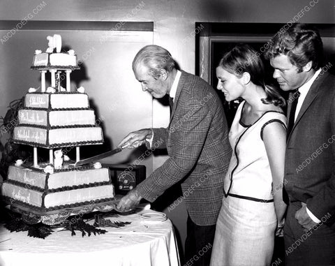 James Stewart Doug McClure cutting a giant cake 8b20-11885
