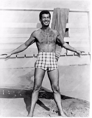 George Nader in his swimming trunks at the beach 8b20-12081