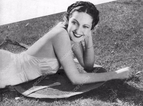 beautiful Dorothy Lamour sunbathing laying on the grass 8b20-12228