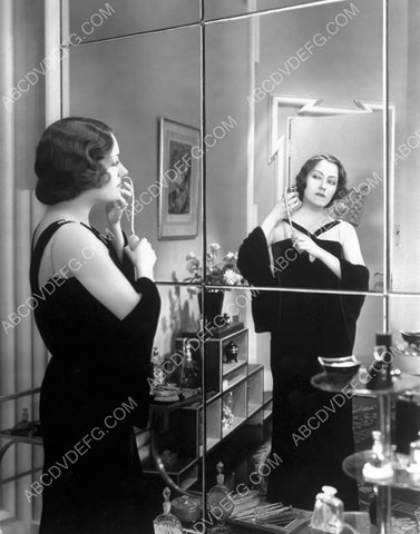 Gloria Swanson in the mirror with her perfume bottle 8b20-12360