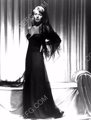 Lana Turner black dress chaise lounge portrait 8b20-1290