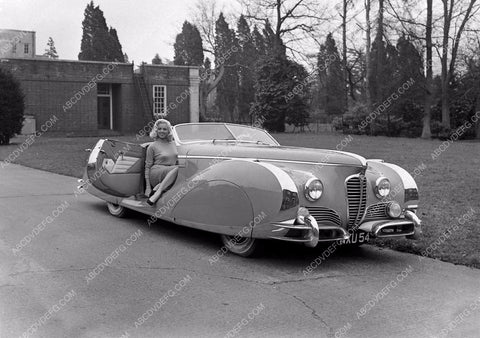 Diana Dors poses with her new futuristic automobile 8b20-13935